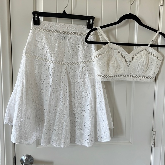 A beautiful 2 piece set Small. The top is a bra top and a high-low skirt. - Picture 1 of 6